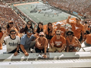 Tamires Marques with friends at University of Texas Football Game